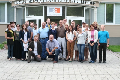 Group photo in front of a Siberian Federal University building